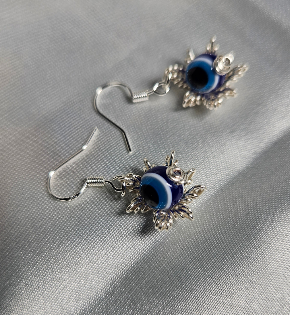 Evil eye silver star earrings