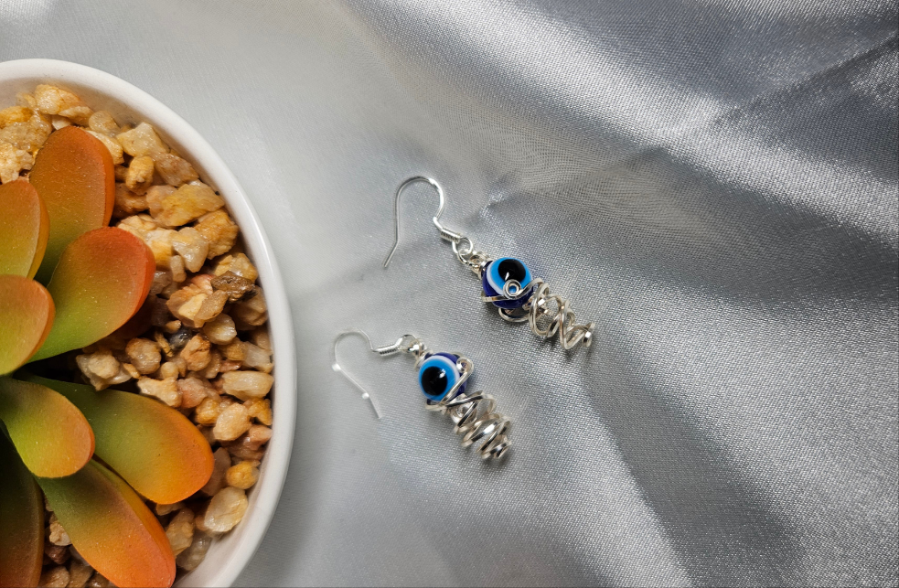 Evil eye swirl earrings