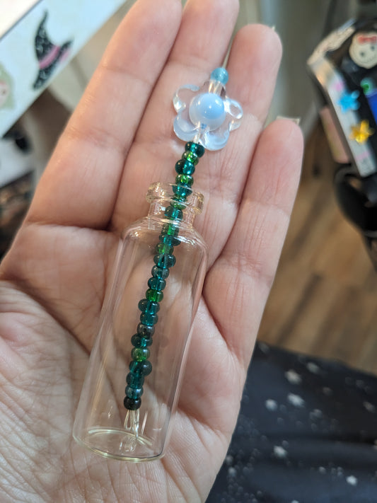 Single beaded flower & tiny glass jar